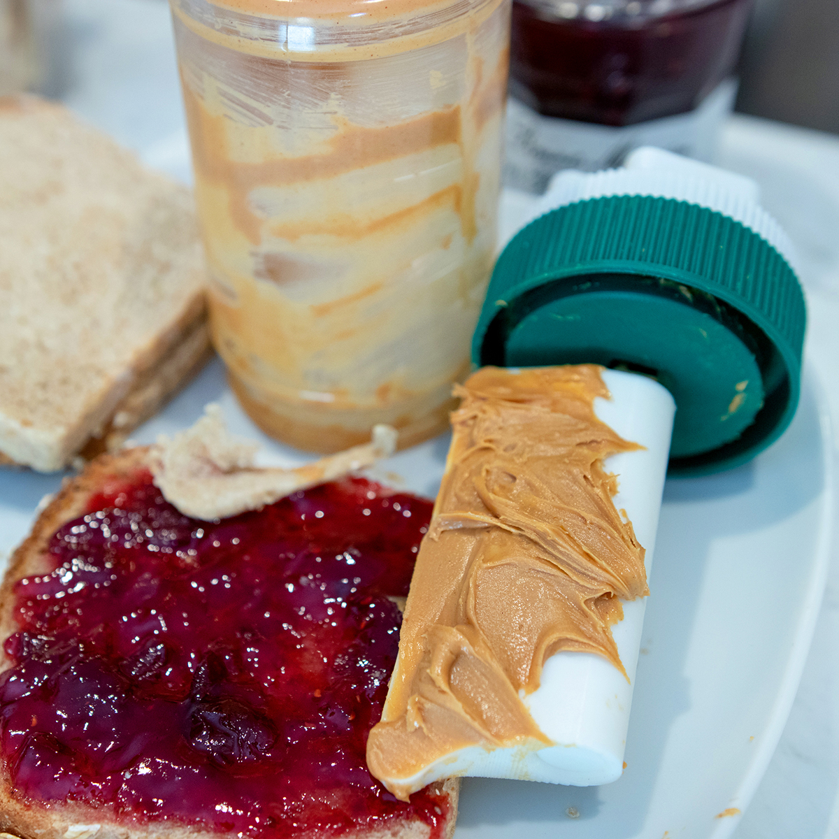 The Spinning Spread Scooper automatically cleans your peanut butter jars  hands-free! 